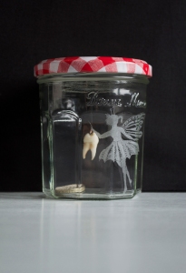 Bonne Maman 2013 Engraved jar, thread, tooth, one pound coin.